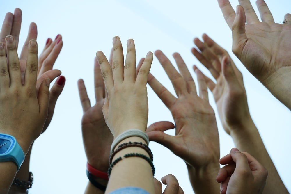 Group raising hands-2